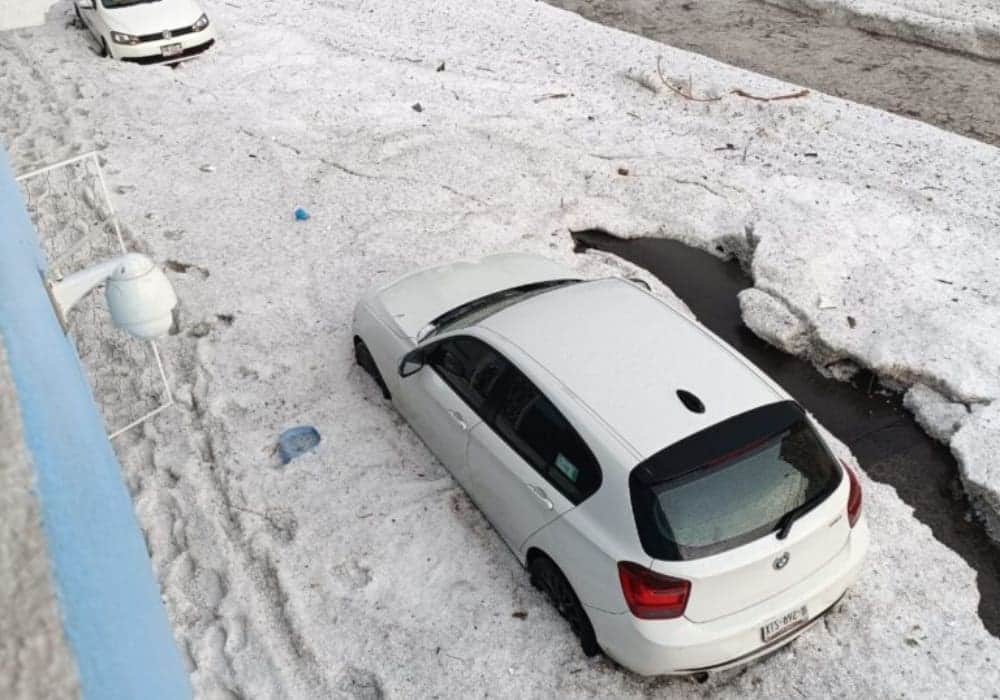 Videos: Intensa lluvia y granizada causan estragos en Puebla