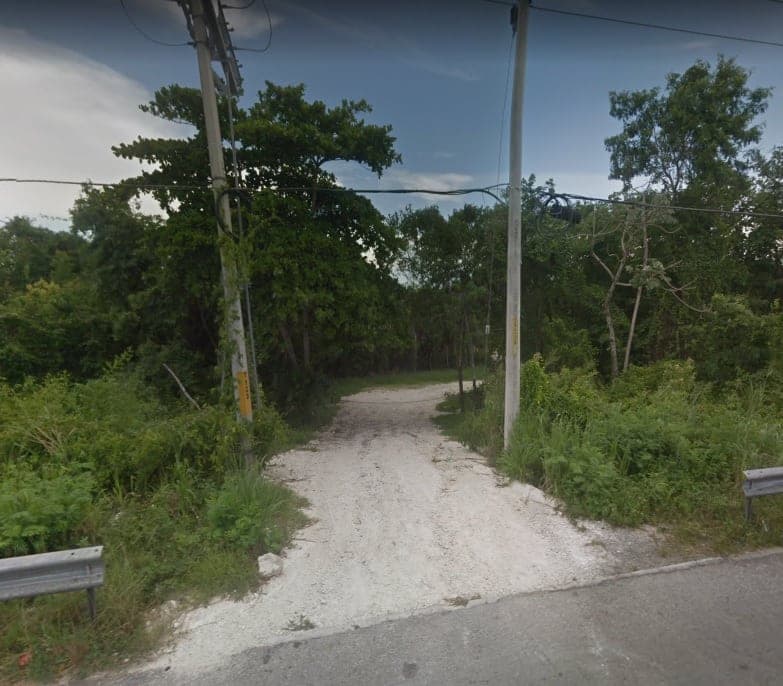 Encuentran cadáver de mujer en Solidaridad; se le intentó quemar