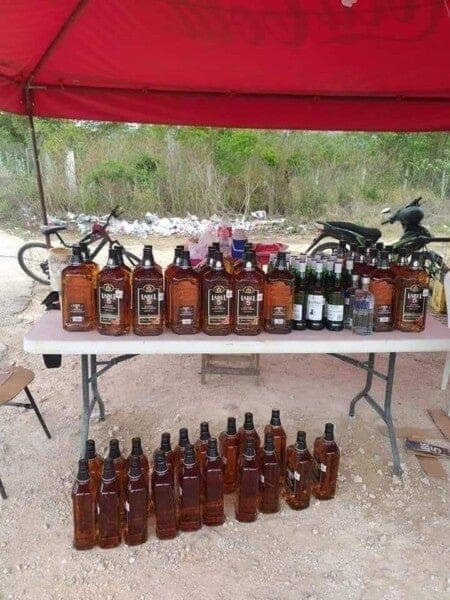 Decomisan maleta repleta de alcohol en autobús que se dirigía a Quintana Roo