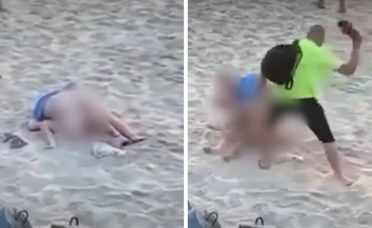 VIDEO: ¡A puro chanclazo! Hombre separa a pareja que hacía 'el delicioso' en la playa