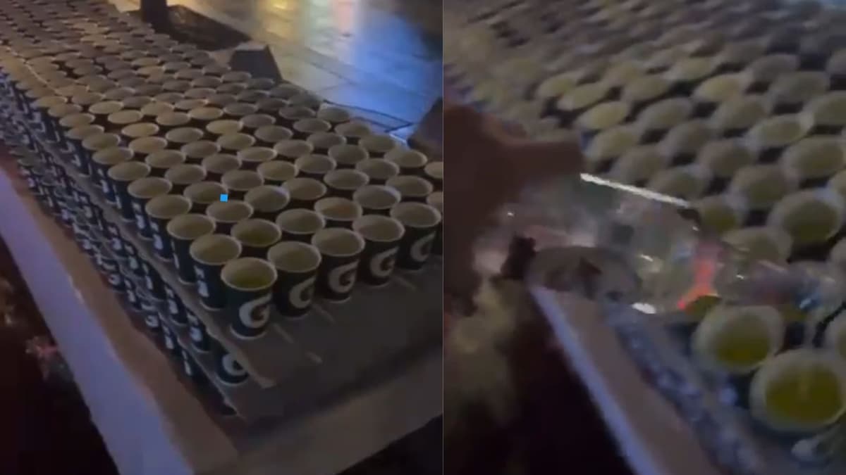 VIDEO: Captan a sujeto colocando alcohol a bebidas del Maratón de CDMX