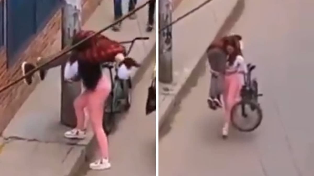 VIDEO: Mujer se viraliza por llevar a su novio borracho en el hombro y cargar una bicicleta al mismo tiempo