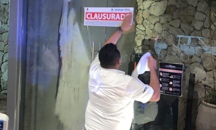 ¡Fotos! Por tener 'casa llena' en semáforo amarillo, cierran restaurante Taboo en Cancún