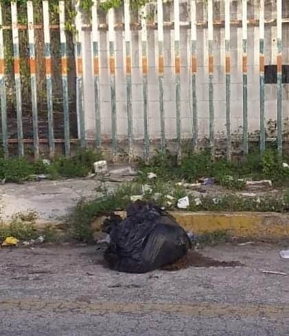 Hallan mujer en un una bolsa de basura en Cancún