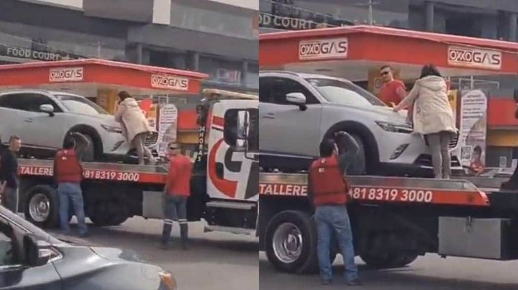 Video: Mujer se 'trepa' a grúa para evitar que se llevaran su camioneta en Monterrey